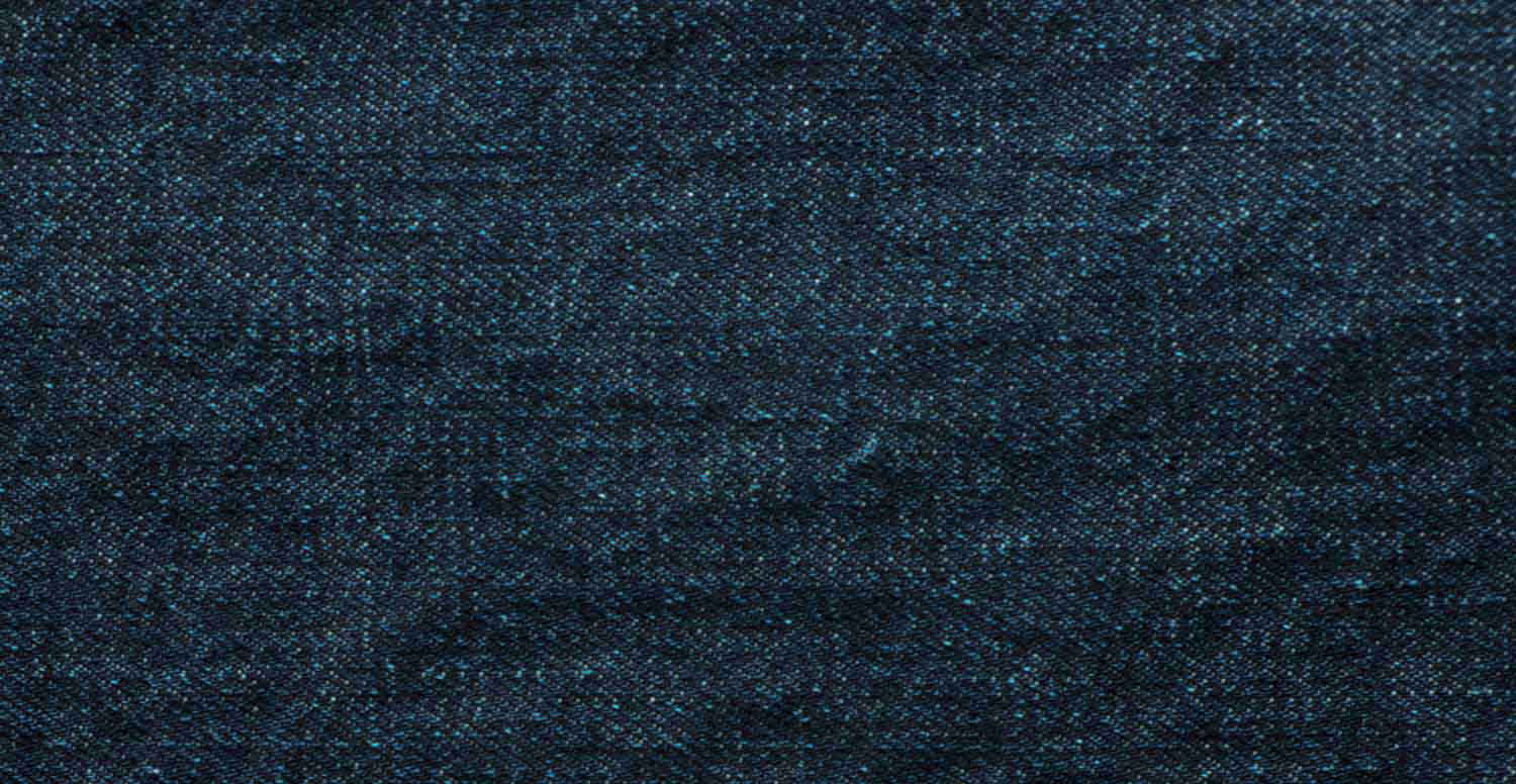 Comparison between a raw denim fabric before and after treatment with Garmon's denim fixing  products