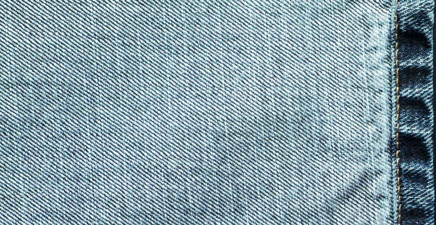 Comparison between a raw denim fabric before and after treatment with Garmon's dispersing products