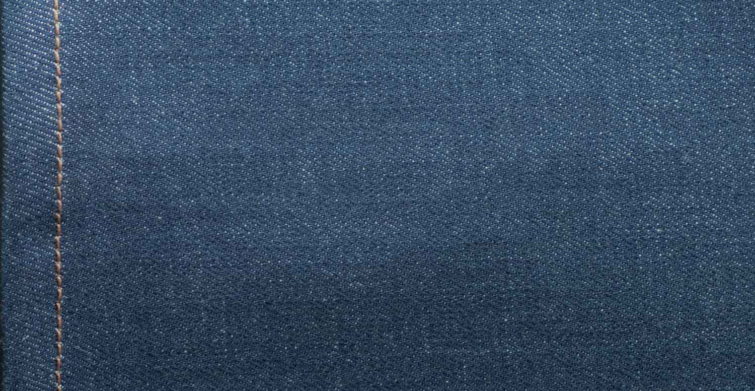 Comparison between a raw denim fabric before and after stone washing with Garmon's Geopower Nps